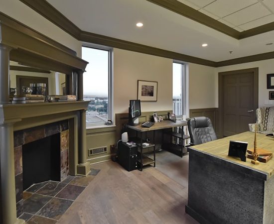 A Living Room Filled With Furniture And A Large Window